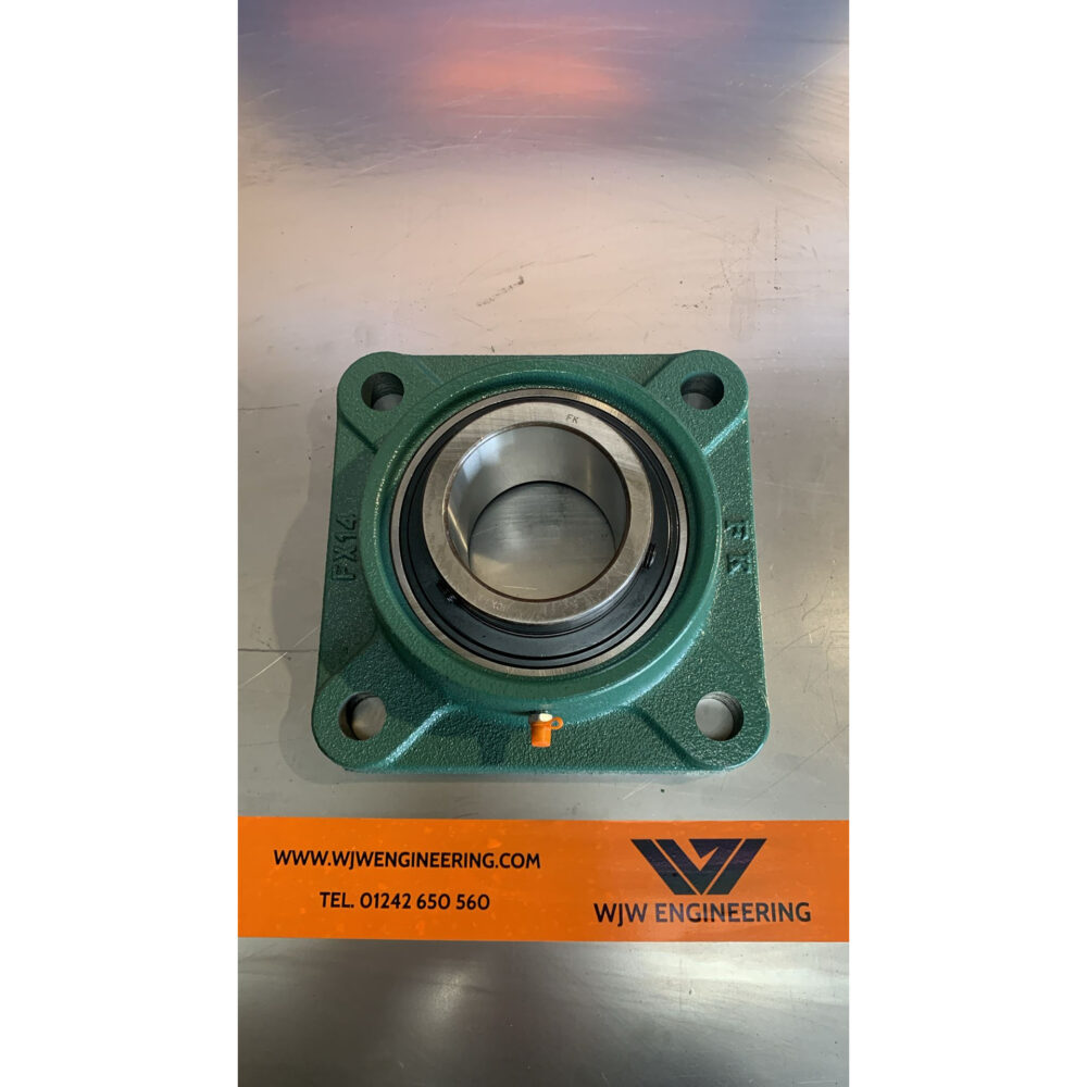 Rear auger bearing