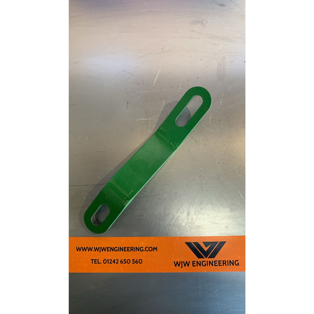 Fold-Down Tray Shelf to Auger Chamber Tie Plate