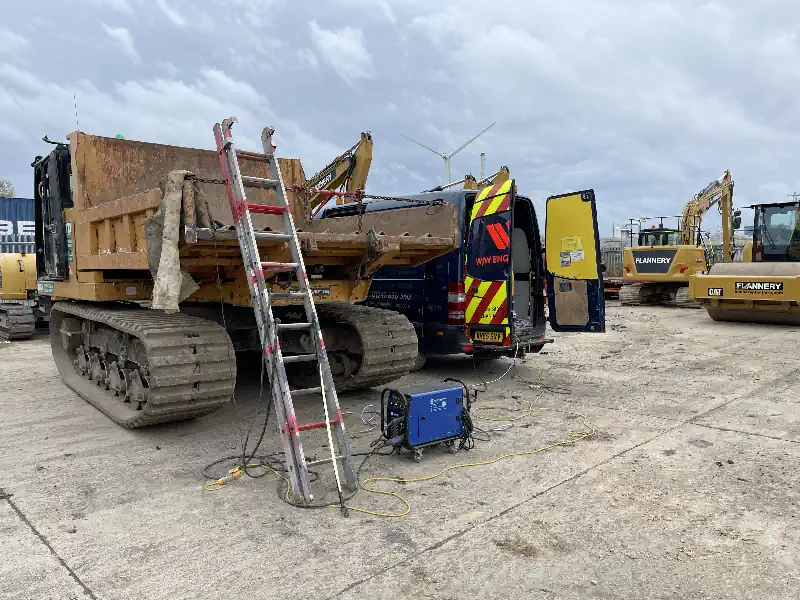 Mobile Welding & Fabrication. Dumper Truck being welded on site.